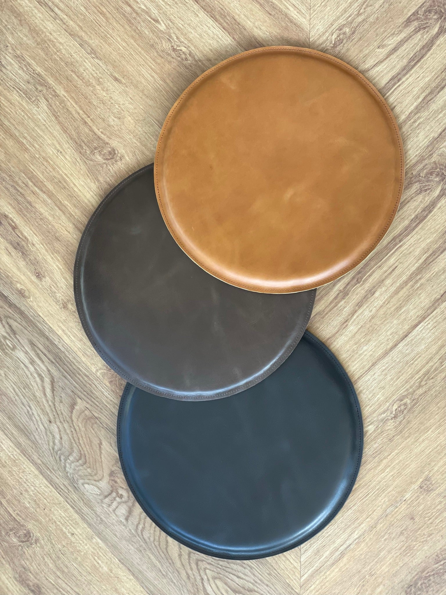Tan, brown and black. Leather Round Cushion Tan by Modoun Home Decor