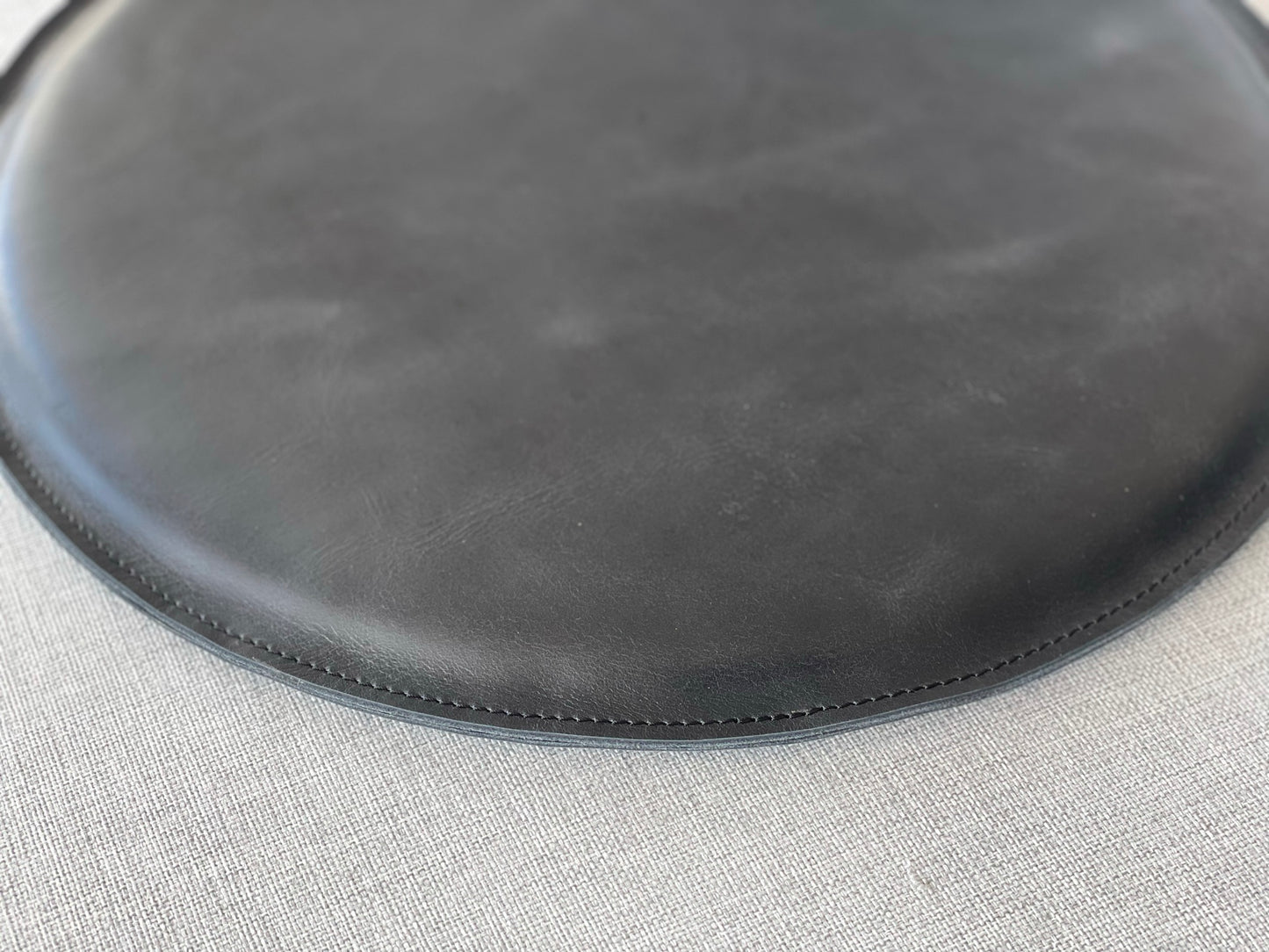 Stitching detail. Leather Round Cushion Black by Modoun Home Decor