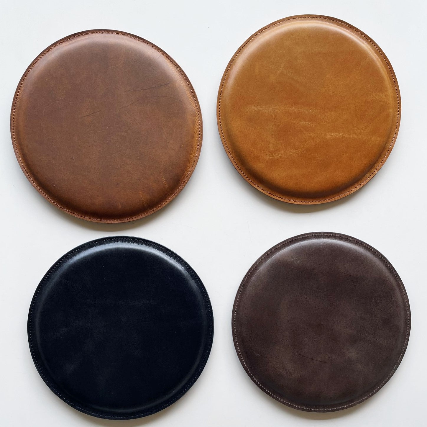 Distressed tan, tan, black and brown. Leather Round Cushion Tan by Modoun Home Decor